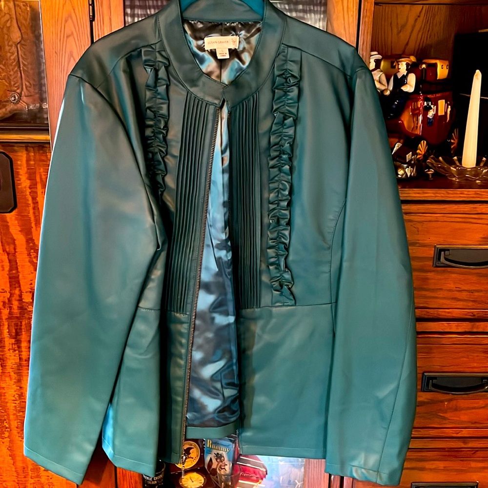 Turquoise, large zip up jacket with satin lining.